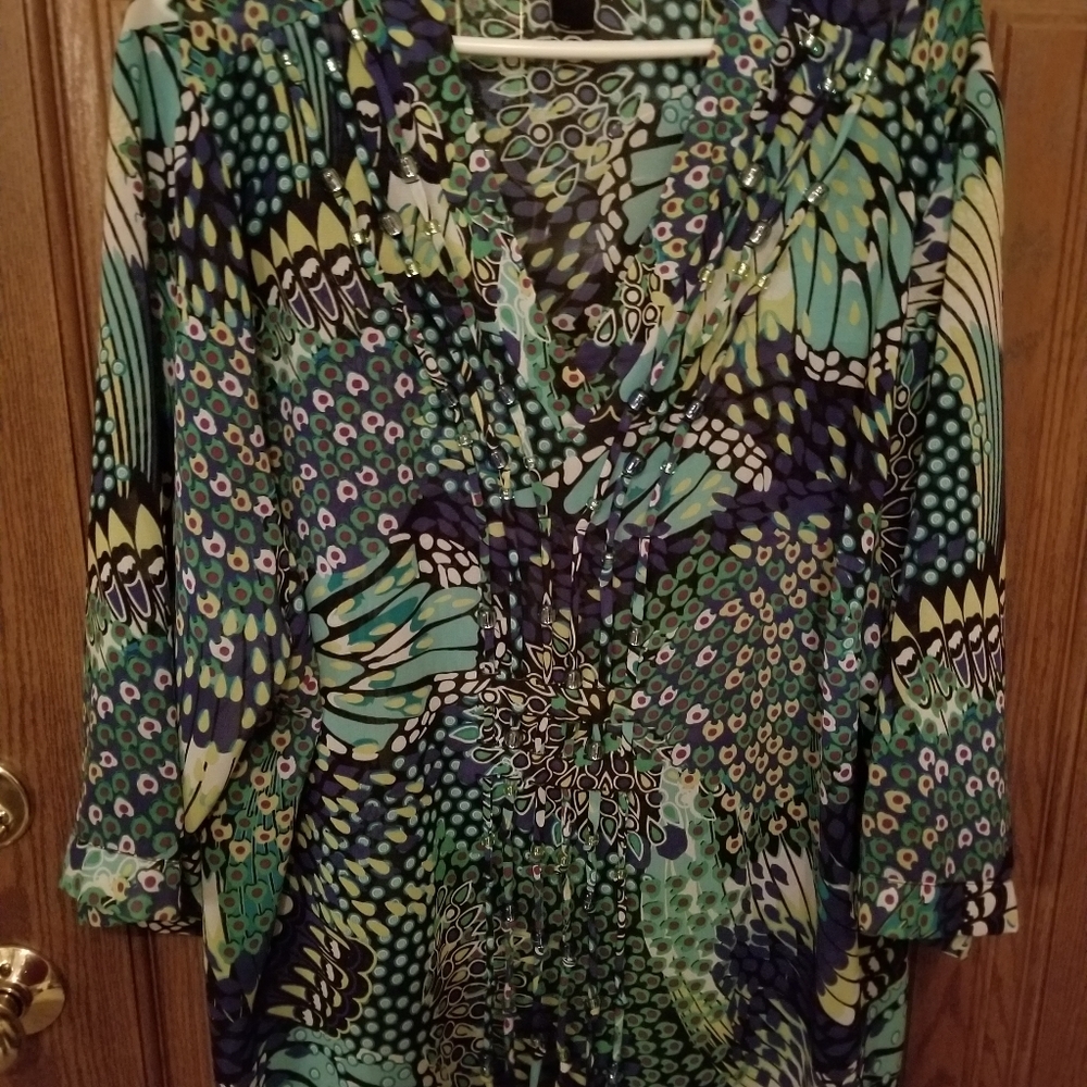 Mid length sleeve semi sheer top